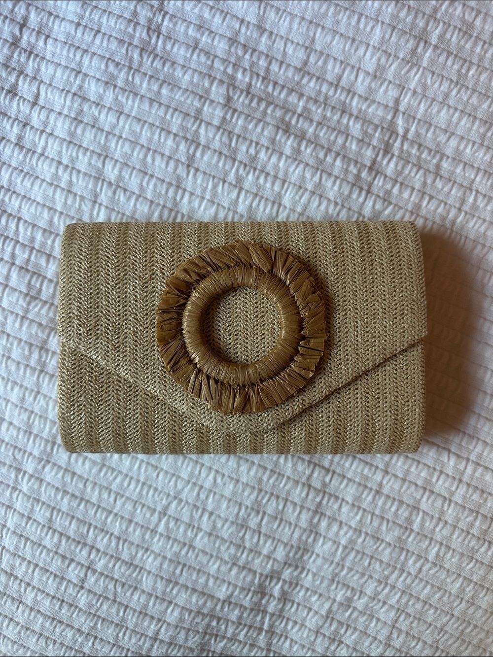 Amazon Tan Woven Straw Clutch with Decorative Circular Accent
